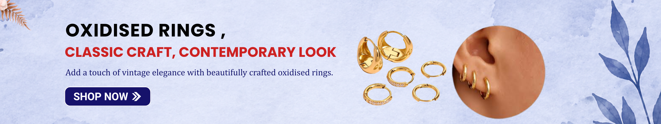 Elegant oxidised rings and gold-tone hoop rings displayed with a hand wearing stacked rings, highlighting vintage-inspired contemporary jewelry.