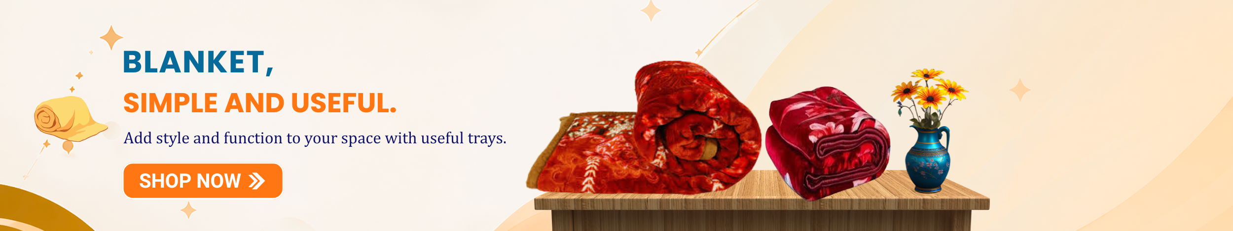 Soft fleece blankets in red floral design neatly folded on a table with “Shop Now” button promoting warm and comfortable blankets for home use.